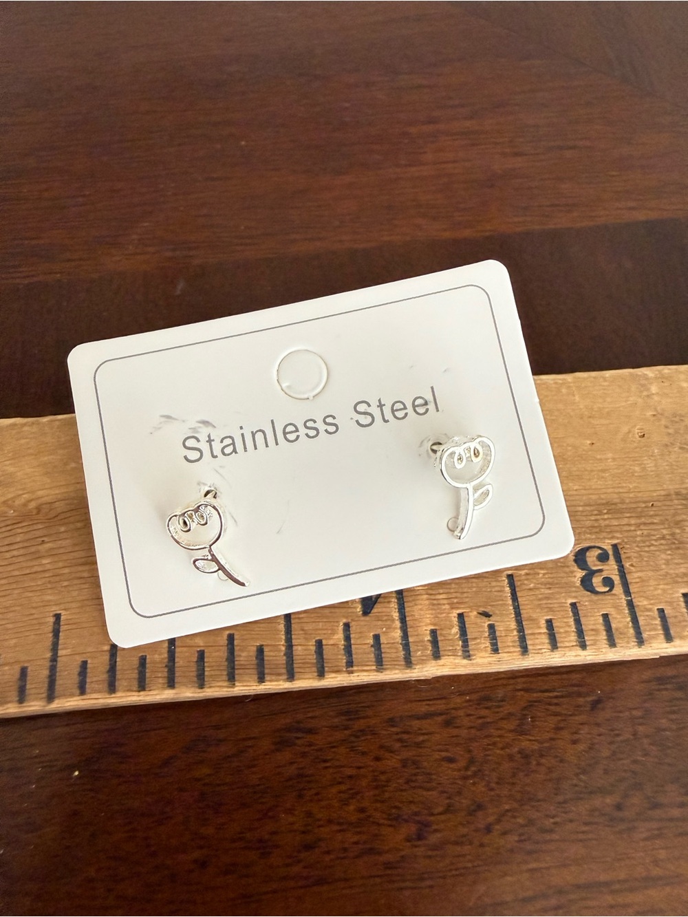 New no tag stainless steel rose earrings